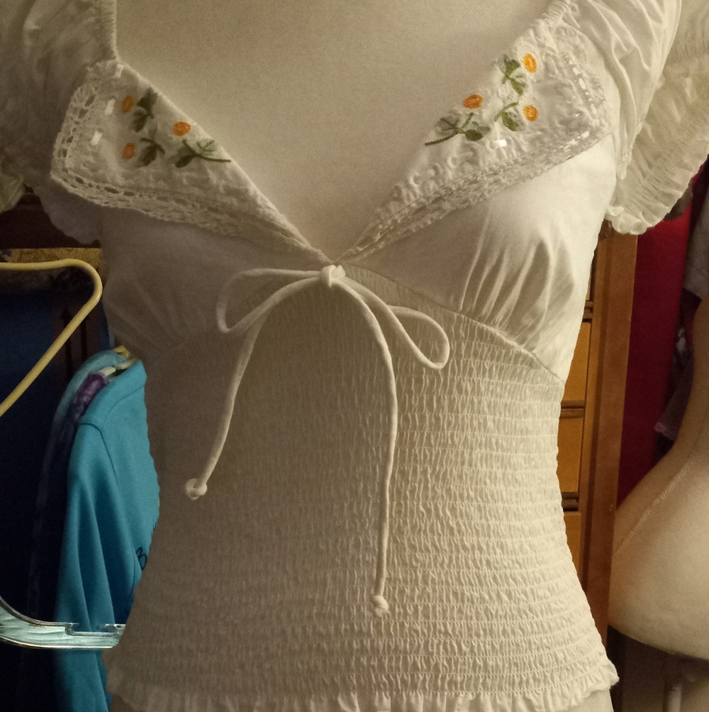 New,tag white smocked peasant top  embroidered floral detail,cropped size medium